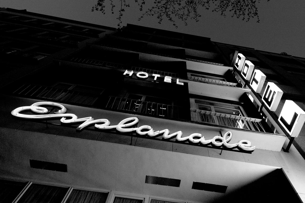 Hotel Esplanade Cologne — Neon sign facade at night, black and white